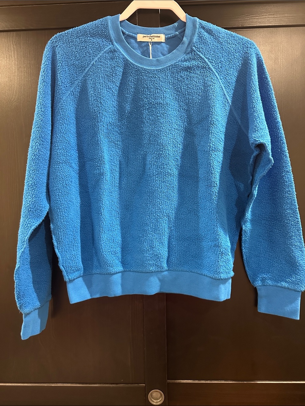 perfectwhitetee Women's Crewneck Fleece Sweater in Vibrant Blue